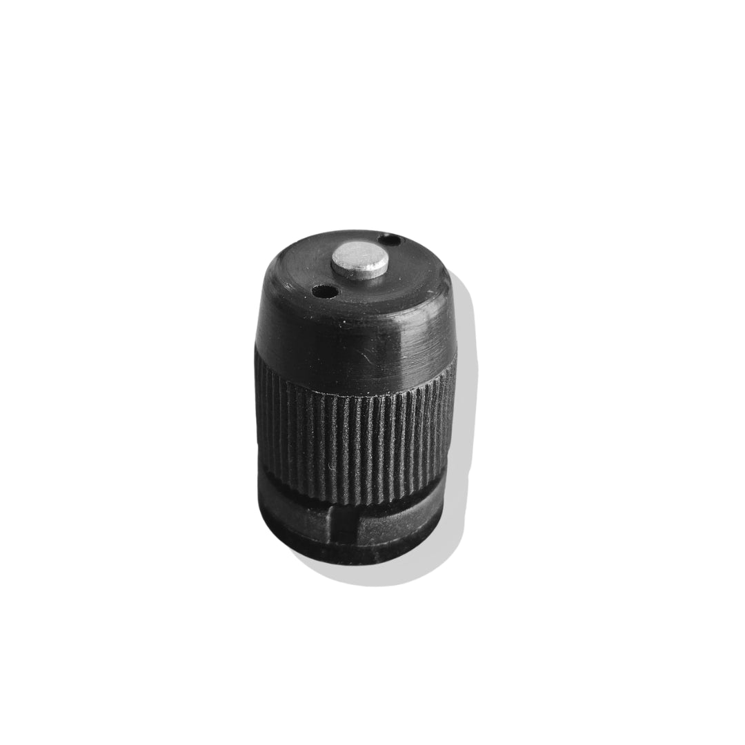 Nottolino sferico in plastica nera con inserto metallico centrale, componente di ricambio per l'arresto dei finestrini scorrevoli della Citroën Dyane.